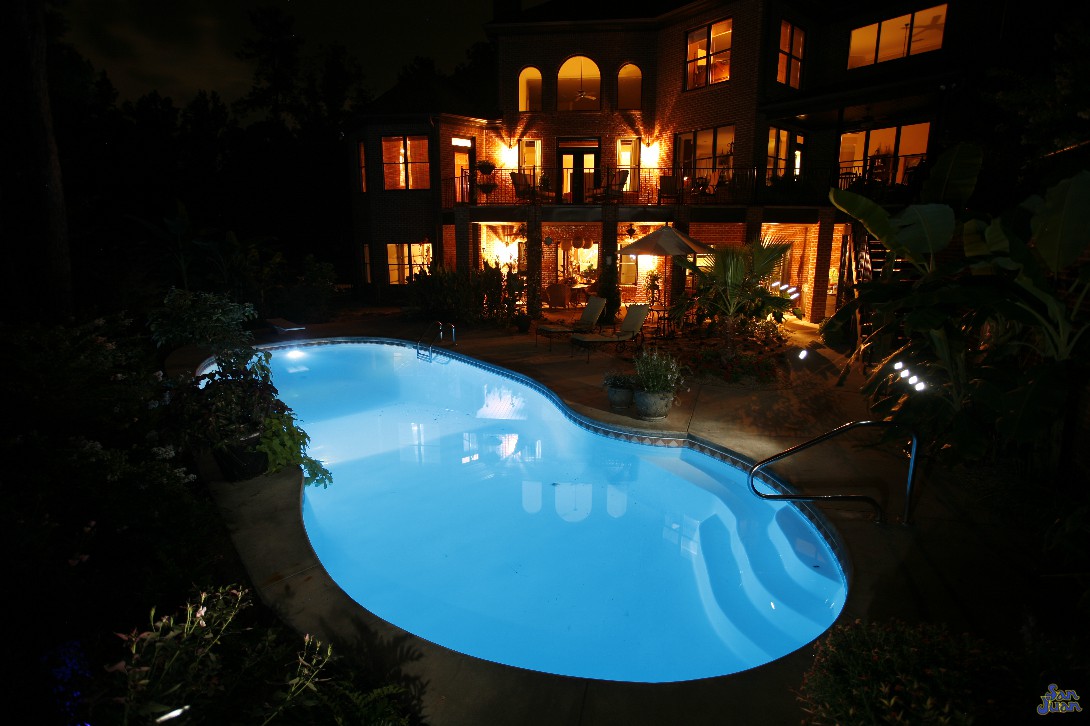 Outdoor fiberglass pools with LED Lighting at night for a beautiful look