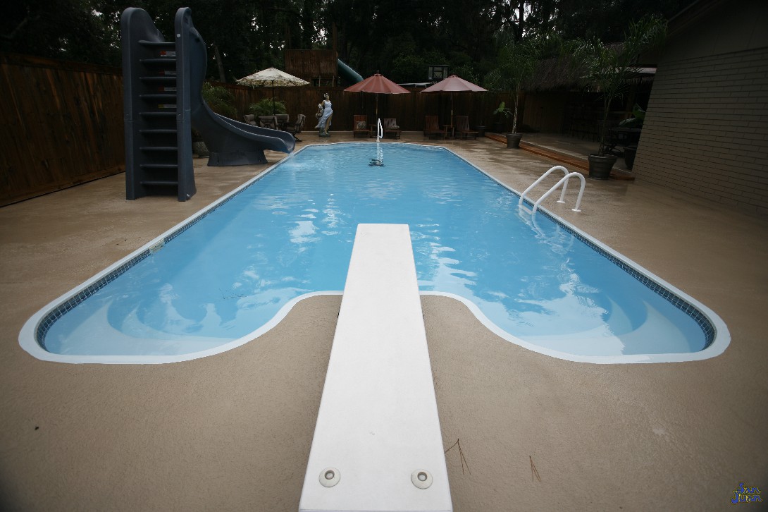 Cannonball! Look out sisters, your brother is sure to create as big of splash as possible off of this diving board. May want to back up that chair a little!