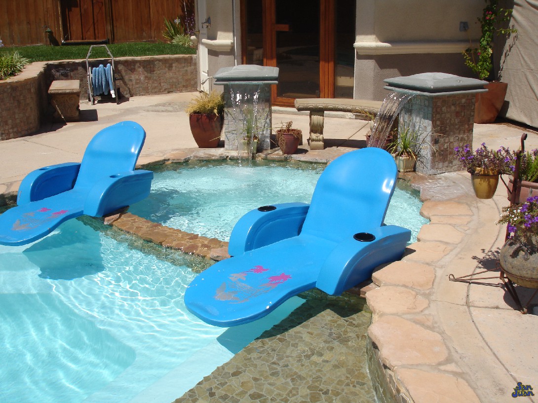 mirage pool shape with wooden deck in caribbean island