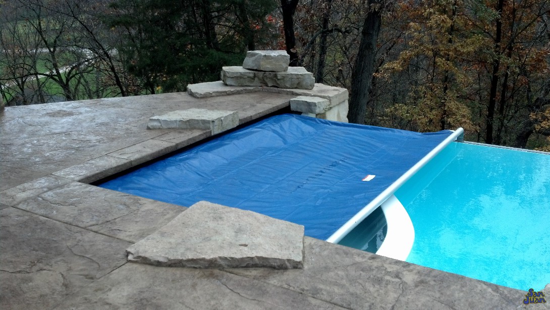 We love being smart with our money. Not only do we love the fun features that our pools have to offer, but we also love the efficiency of our designs. This iPool 2 is depicted with an Automated Pool Cover. These covers are great add-on features that protect your swimming pool from the invasion of pool leaves when not in use. Pair it with some smart iPhone technology & you've got a pool that keeps itself clean when you're not using it. What's cooler than that? 