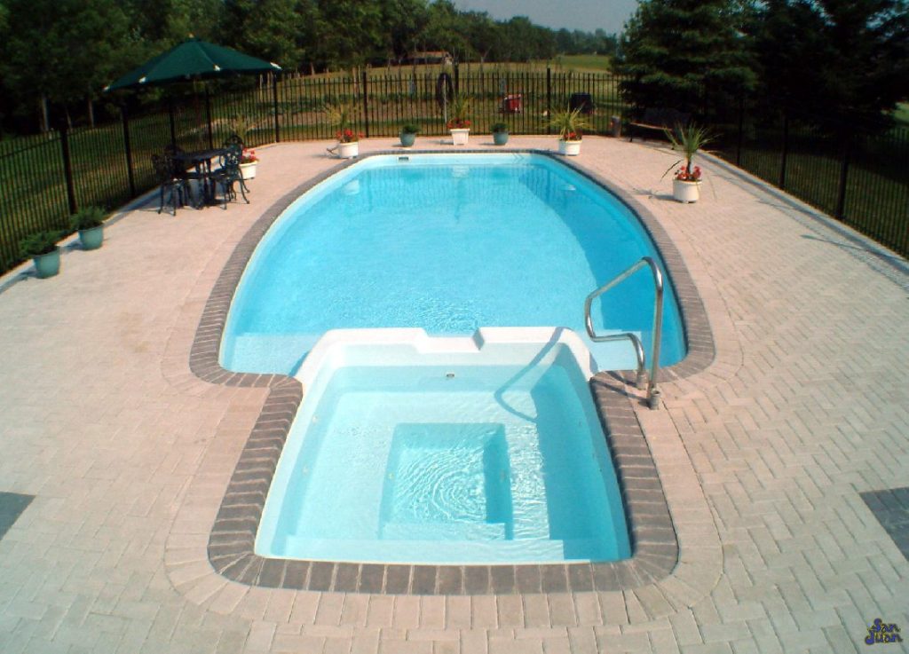 The Olympus is a unique fiberglass pool shape that sports a very nifty attached spa! This fiberglass pool is perfect for a family or multiple people that want to enjoy the full functionality of their fiberglass pool. 