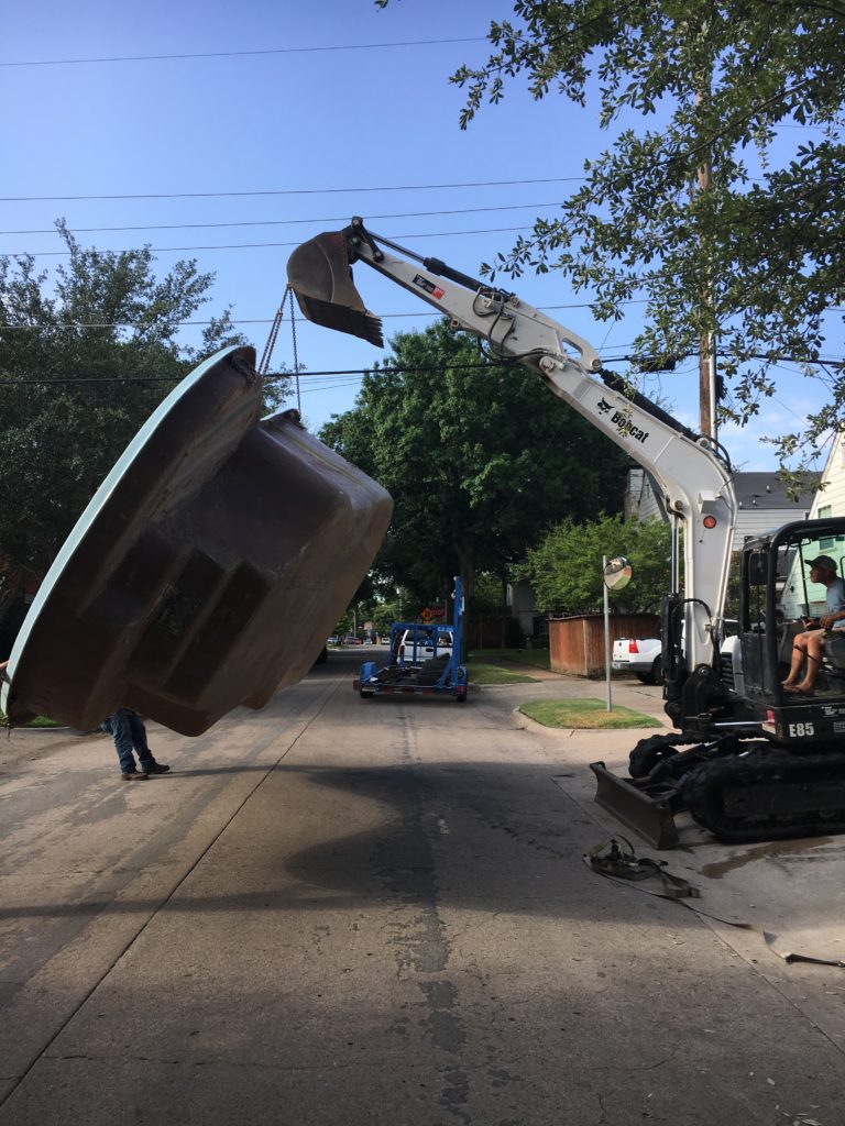 We are hard at work at another fiberglass pool installation in Dallas, TX. This job is located in University Park Dallas. Our fiberglass shells are perfect fits for small to medium sized urban backyards with minimal space for bulky construction equipment. Welcome to fiberglass territory!