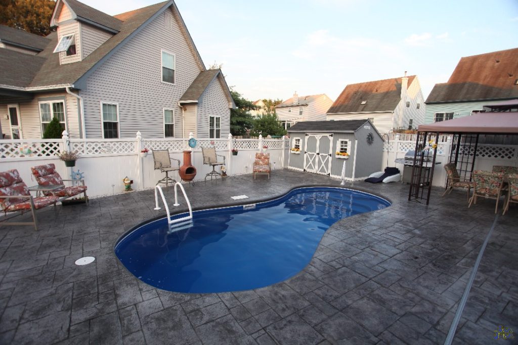 What we'd like to point out in this image is how perfectly this backyard compliments the design and layout of the Cocoa Beach pool model. By selecting the right Gel Coat finish, deck color & backyard accessories - you can create a look that is unique to you and your home!