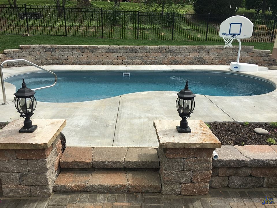 What a beautiful backyard escape! This Sandcastle looks like it's right at home in this attractive cantilever pool deck! Paired nicely with a set of entry steps and basketball set (for the kids), this swimming pool is ready for it's family to return home and enjoy some exciting times outdoors!