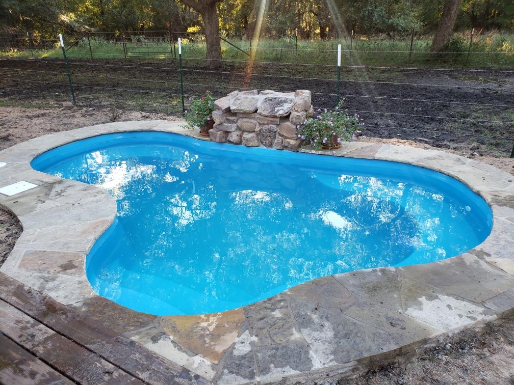 We just completed the installation of a Crystal Springs in Celina TX! This stunning fiberglass swimming pool was installed in a gorgeous rural backyard with lots of natural landscaping - truly stunning!