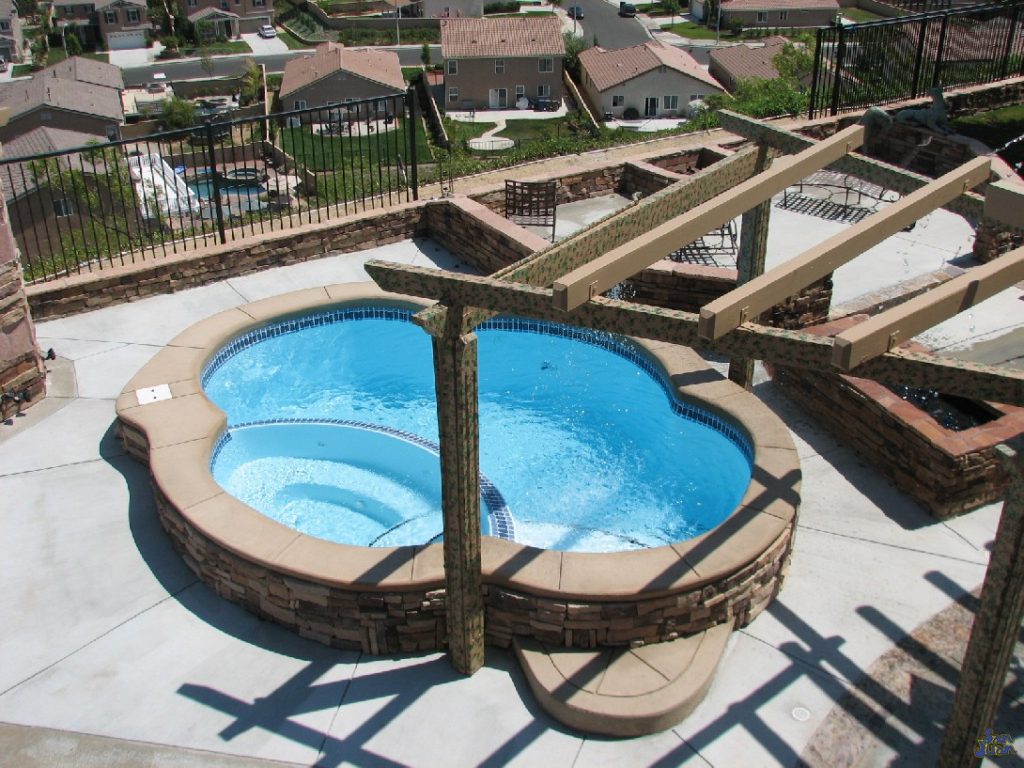 This is a great example of the potential you have with the Crystal Springs. This client installed this pool on a raised beam. Rather than set it entirely in the ground, they raised it up about 12" to create an easier way to enter and exit the swimming pool. 