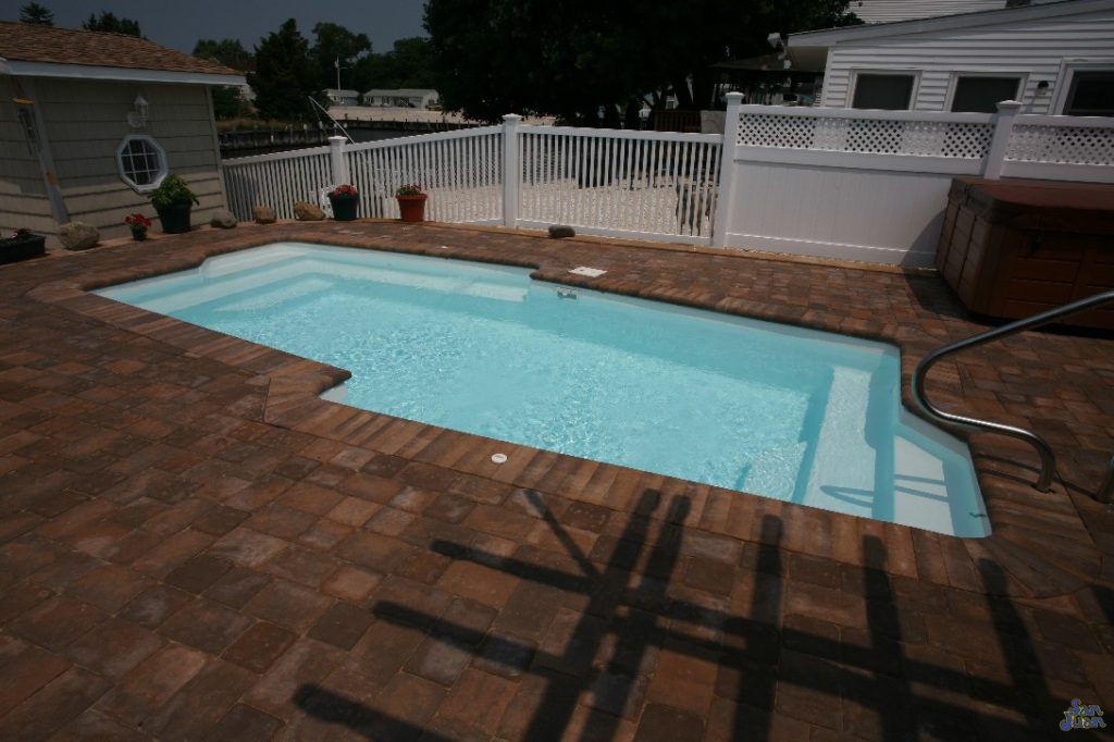 The Malibu is a "cutting edge" free form fiberglass swimming pool with a flat bottom layout. This gorgeous pool shape includes a dual set of corner entry steps and a modern design to enhance your backyard experience!