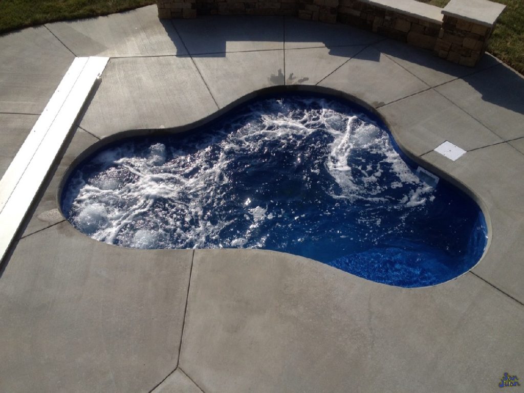 The Montreal Spa is a quaint & compact fiberglass spa with a free form shape & flat bottom. With a depth of only 3' 9" - the Montreal is a comfortable spa for any user. We recommend the Montreal Spa as an add-on to any of our fiberglass swimming pools or as a single unit in a small backyard. 