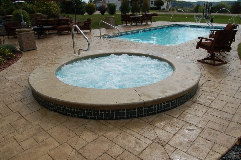 The Sarasota Spa is the perfect add-on product to any of our fiberglass pool options! It's radius design is a classic style that will always retain its popularity. If you've always wanted a way to stay warm in the winter and enjoy your backyard, the Sarasota Spa is the perfect solution!