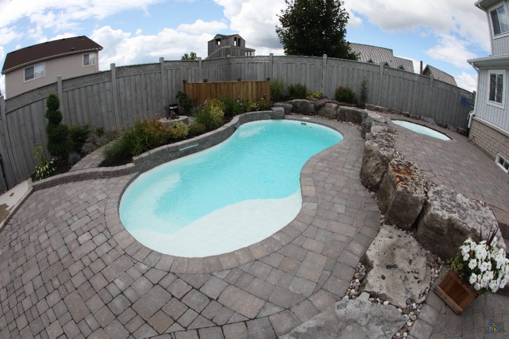 The Sundial is a beautiful free form pool that slightly resembles a "figure-8" layout. This beautiful fiberglass pool  is both petite in size and perfect for our clients who consider themselves to be casual swimmers. You're sure to enjoy the very familiar standard hopper (deep end to one side), curved entry steps and tanning ledge of the Sundial!